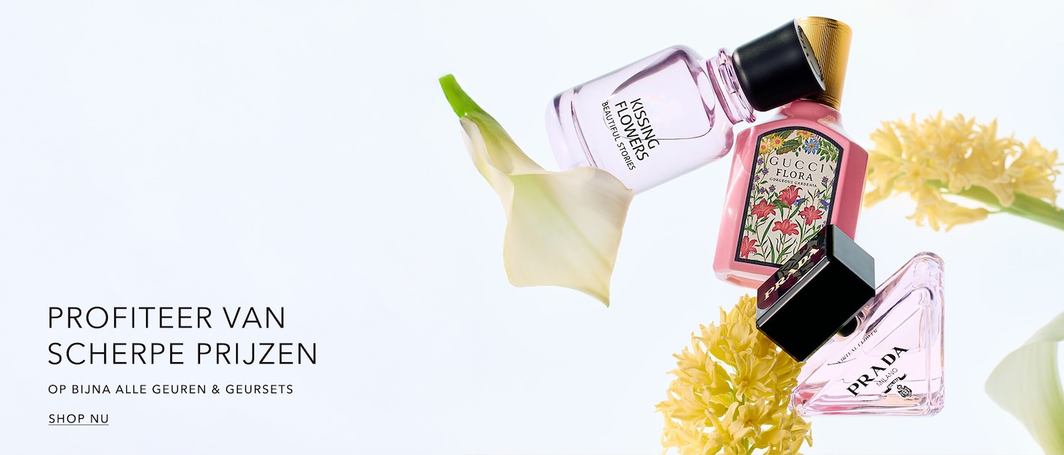 Ontdek een selectie van parfums, waaronder Gucci Flora en Prada, gepresenteerd tussen delicate bloemen.